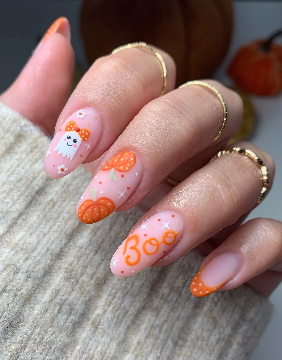 A Pale Pink Base with Orange Seasonal Motifs