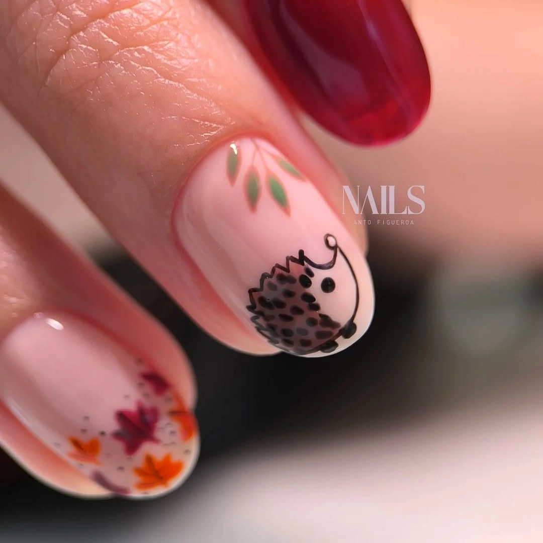 Pink Nails with Black and Orange Edge Motifs