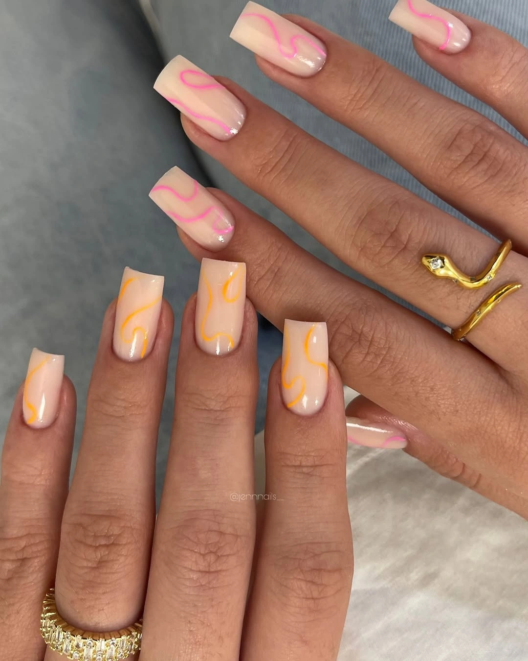 Peach square nails with thin hot pink loop line art