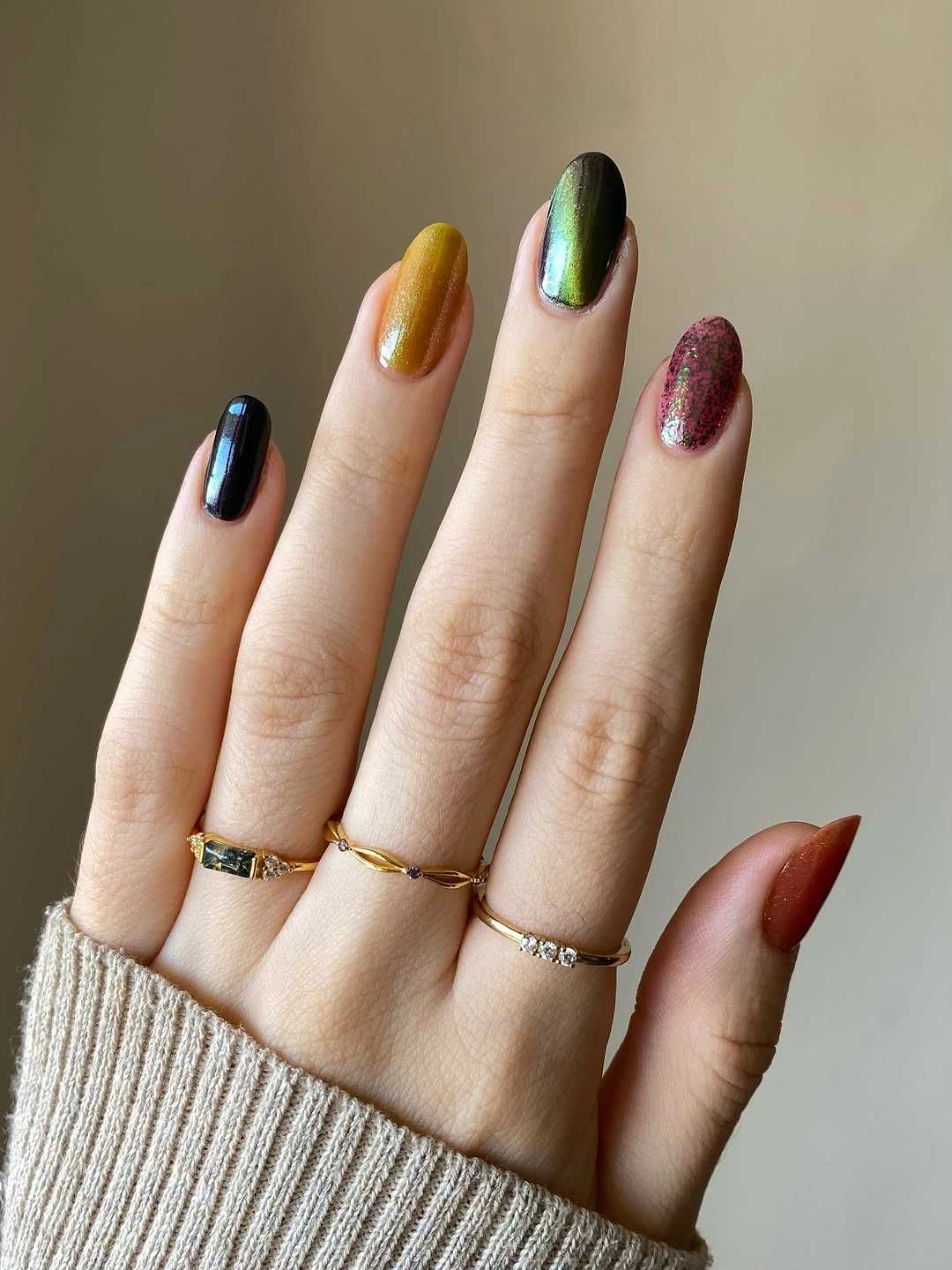 long almond nails in navy mustard olive burgundy and orange