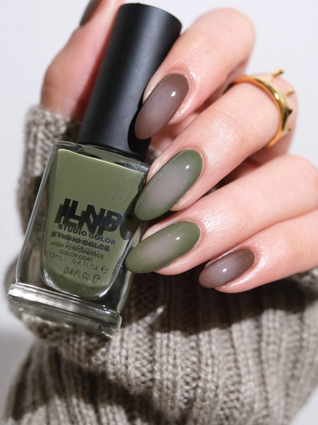 medium almond nails in muted olive gray mauve and neutral tones