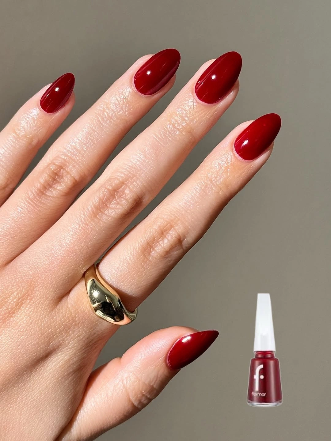short almond nails in glossy bright red