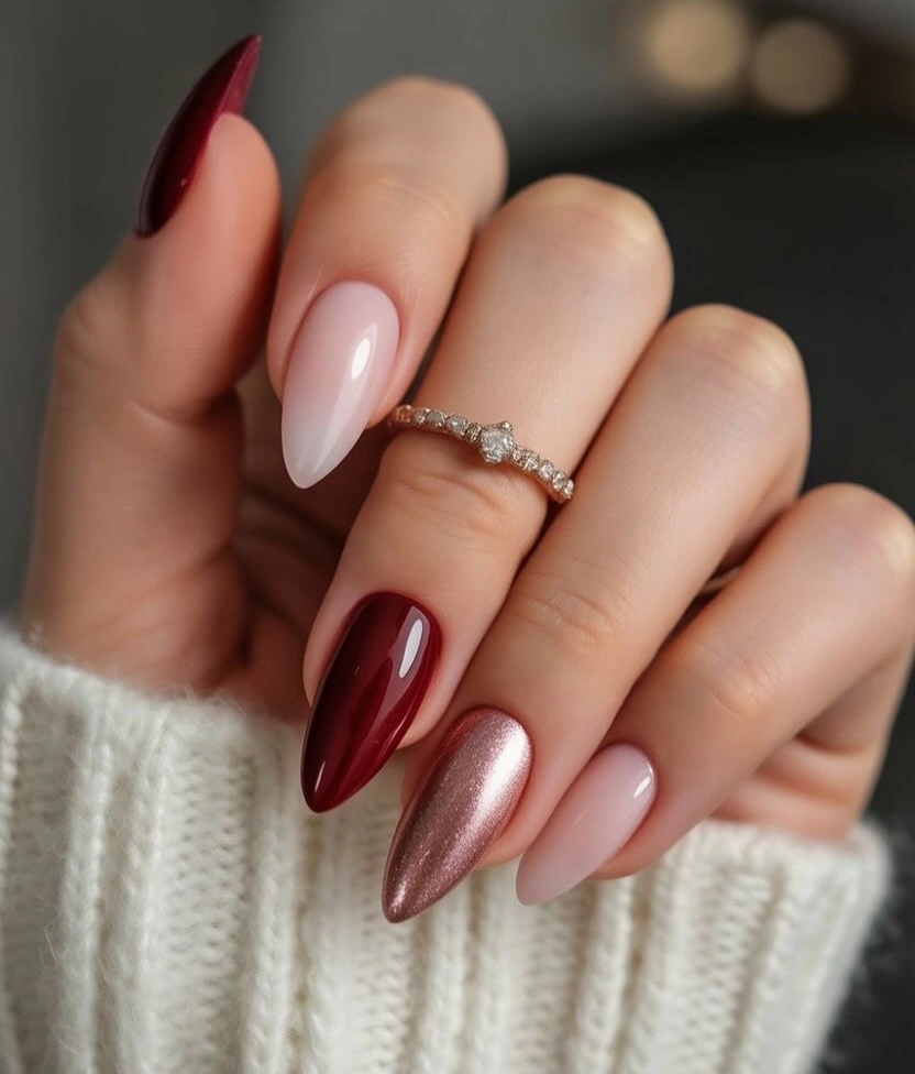 medium almond nails with blush pink burgundy and rose tones