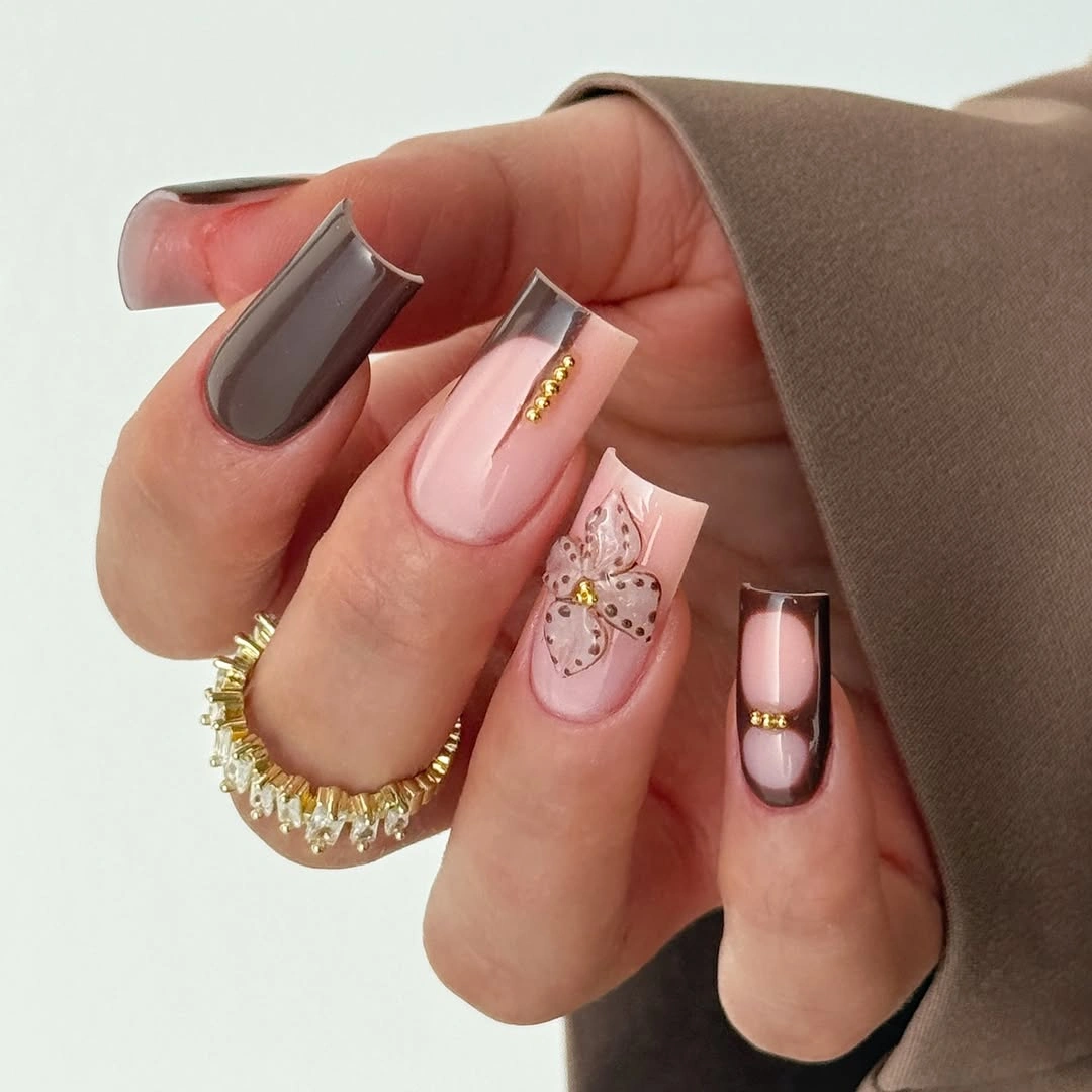 Blush tapered nails with gray metallic and fine gold accents