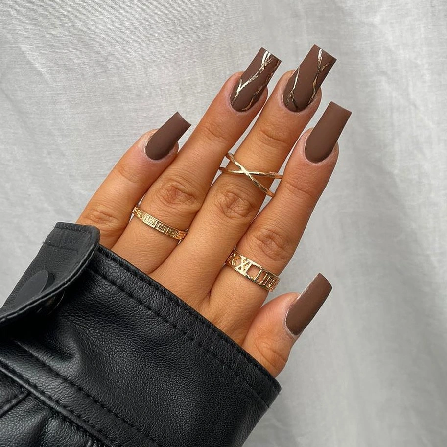 Long coffin nails in an even deep chocolate brown shade