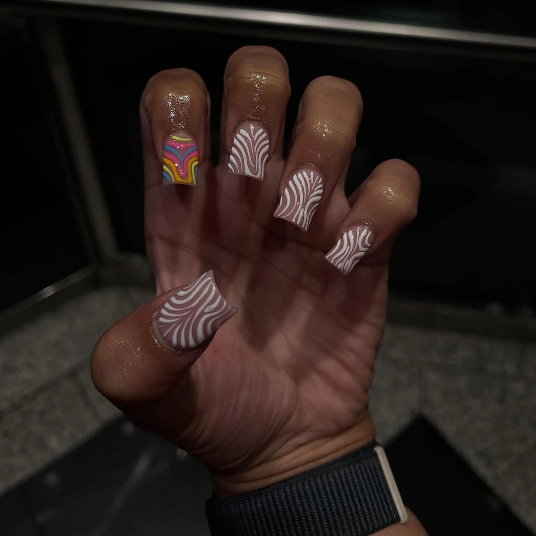 mauve square nails with repeated white wave linework
