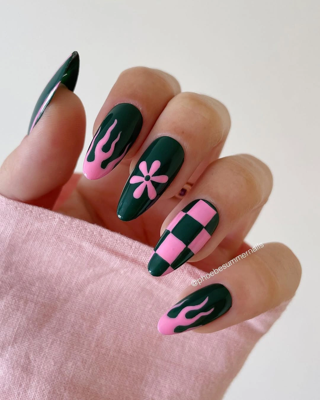 Medium square green nails with pink flames a daisy and checkerboard