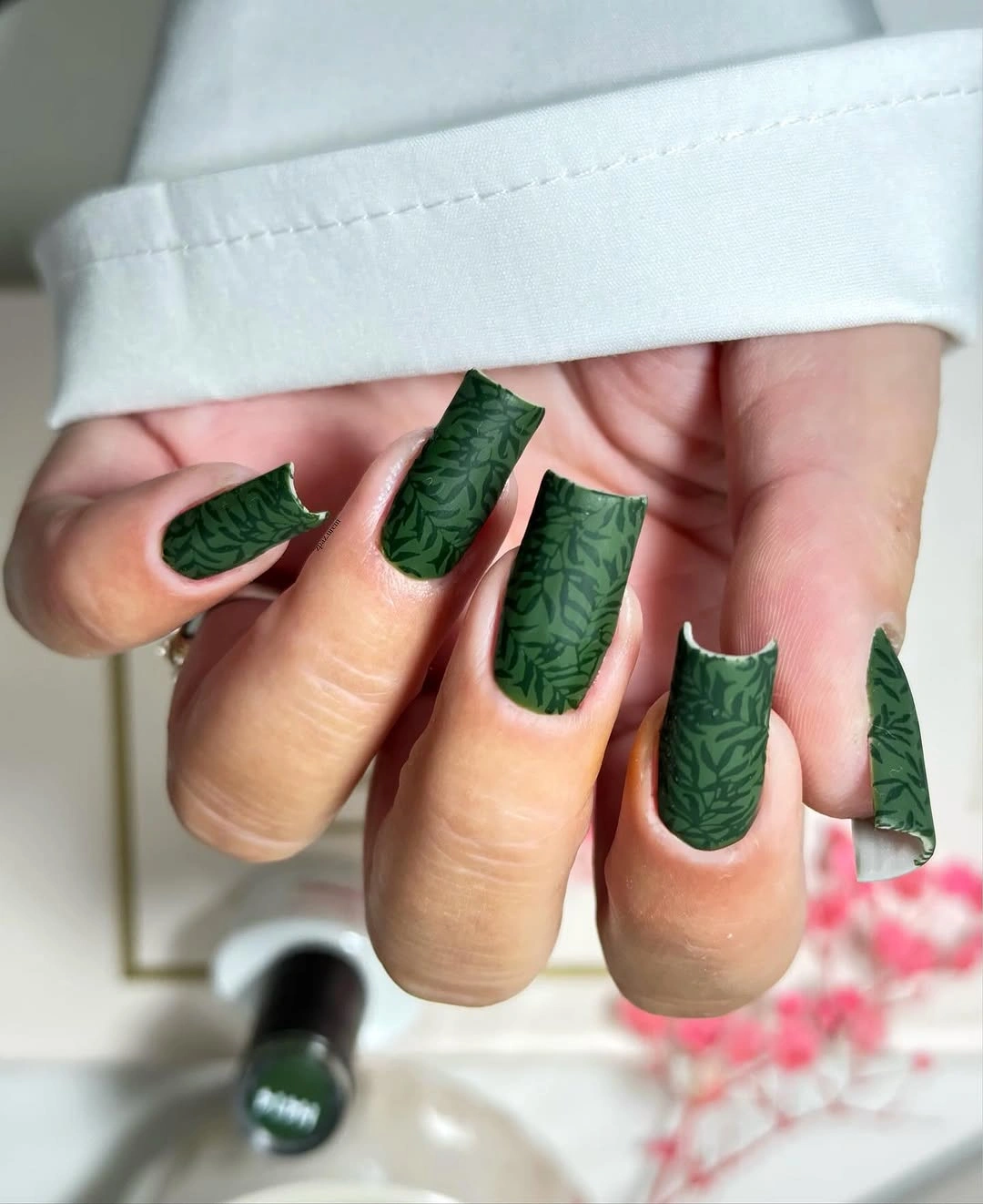 Medium square forest green nails with subtle tone-on-tone texture