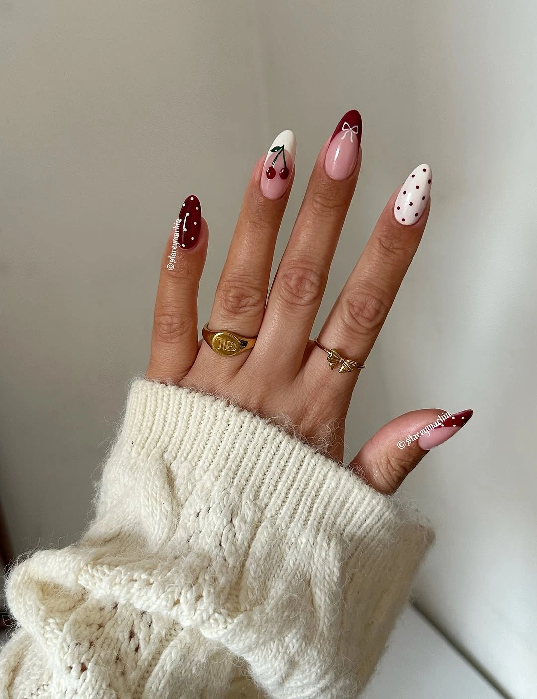 Long almond nails with red glitter white florals pink tips and dots