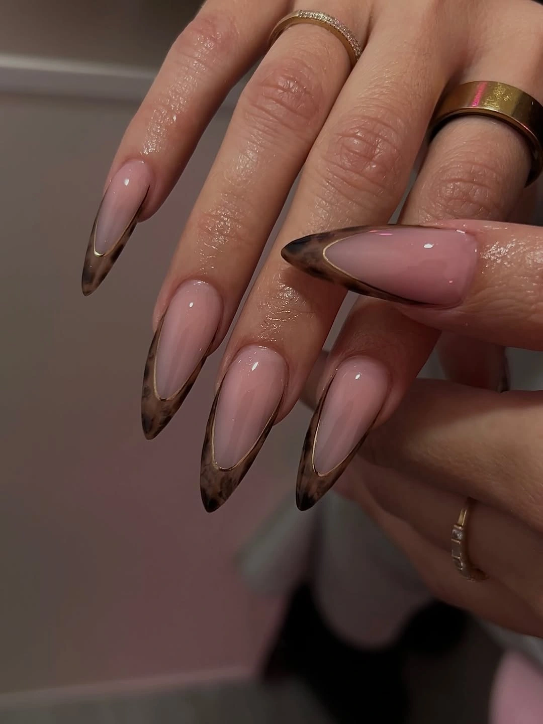 Long blush almond nails with double chocolate brown French lines