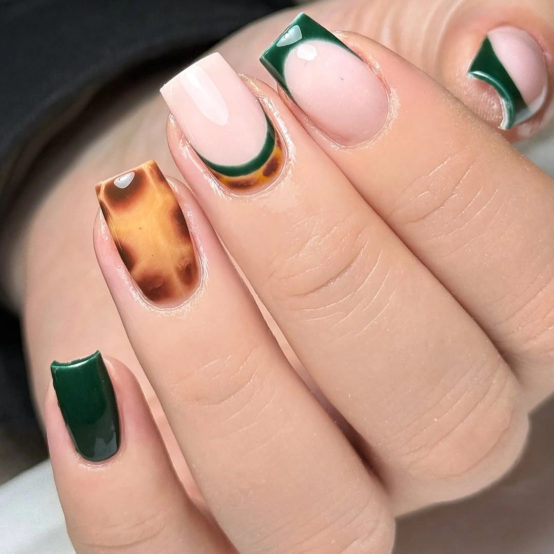 Short forest green French nails with tortoiseshell accent