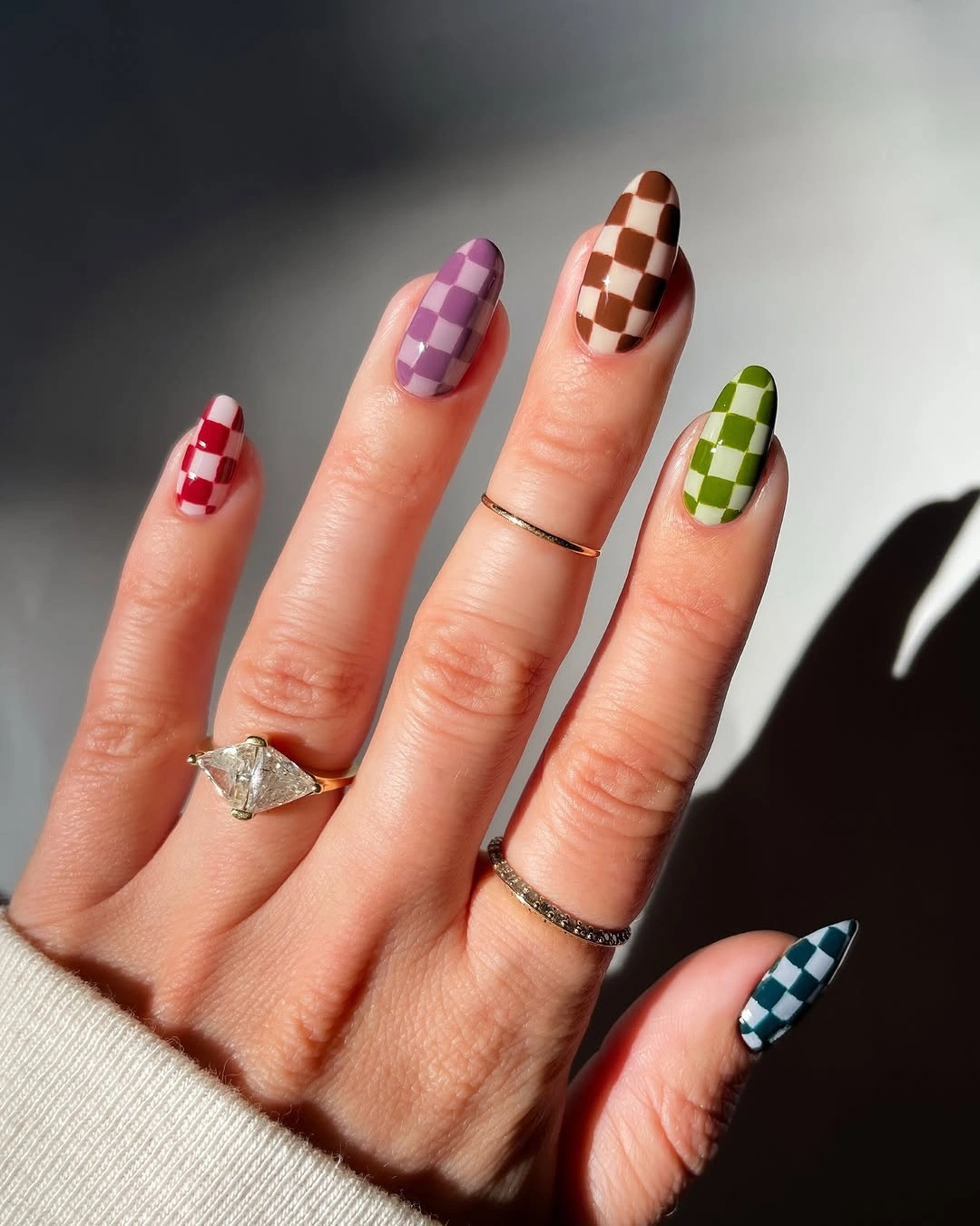 Glossy checkerboard nails in mixed muted fall colors