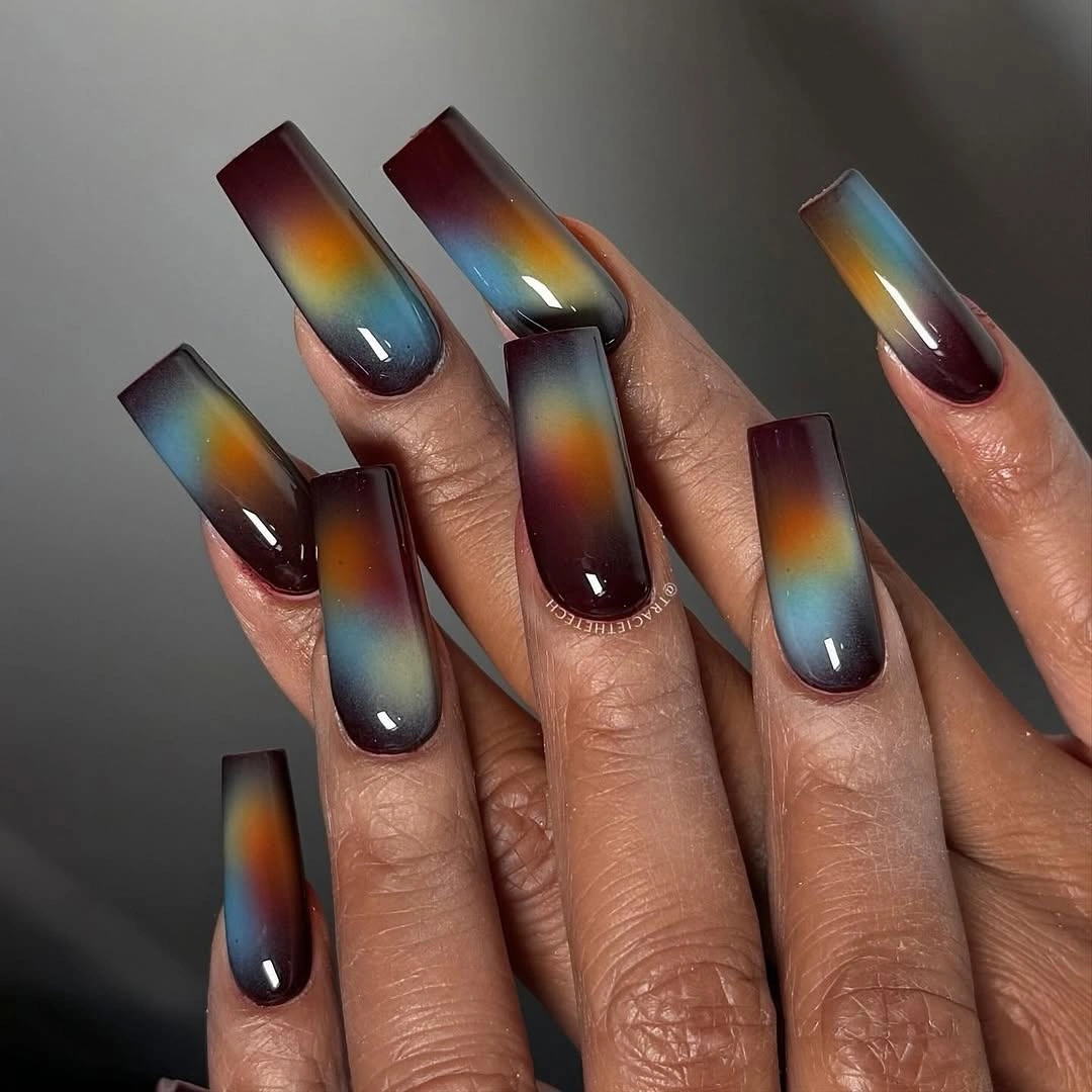 Long square aura nails with smoky burgundy edges