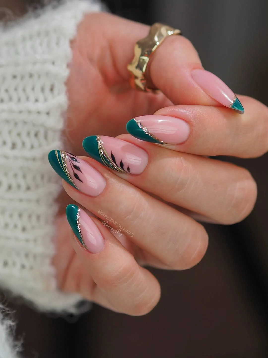 Teal diagonal French nails with gold sparkle lines