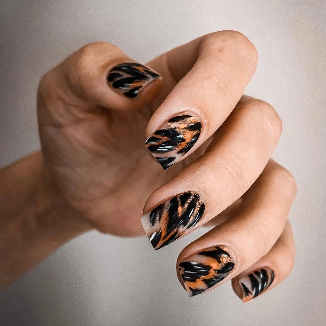 Black cream and copper abstract brush strokes on square nails