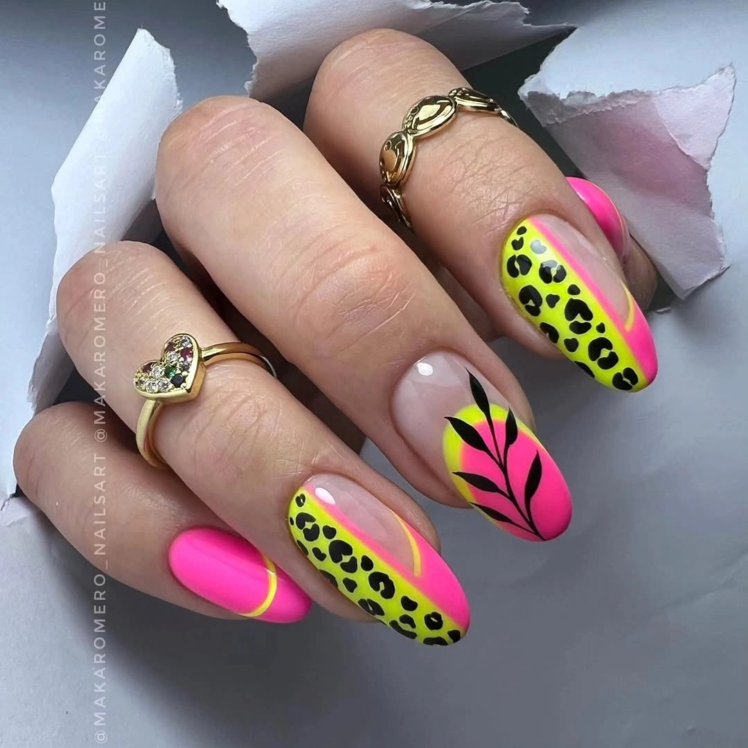 Long almond neon pink lime nails with black leopard accents