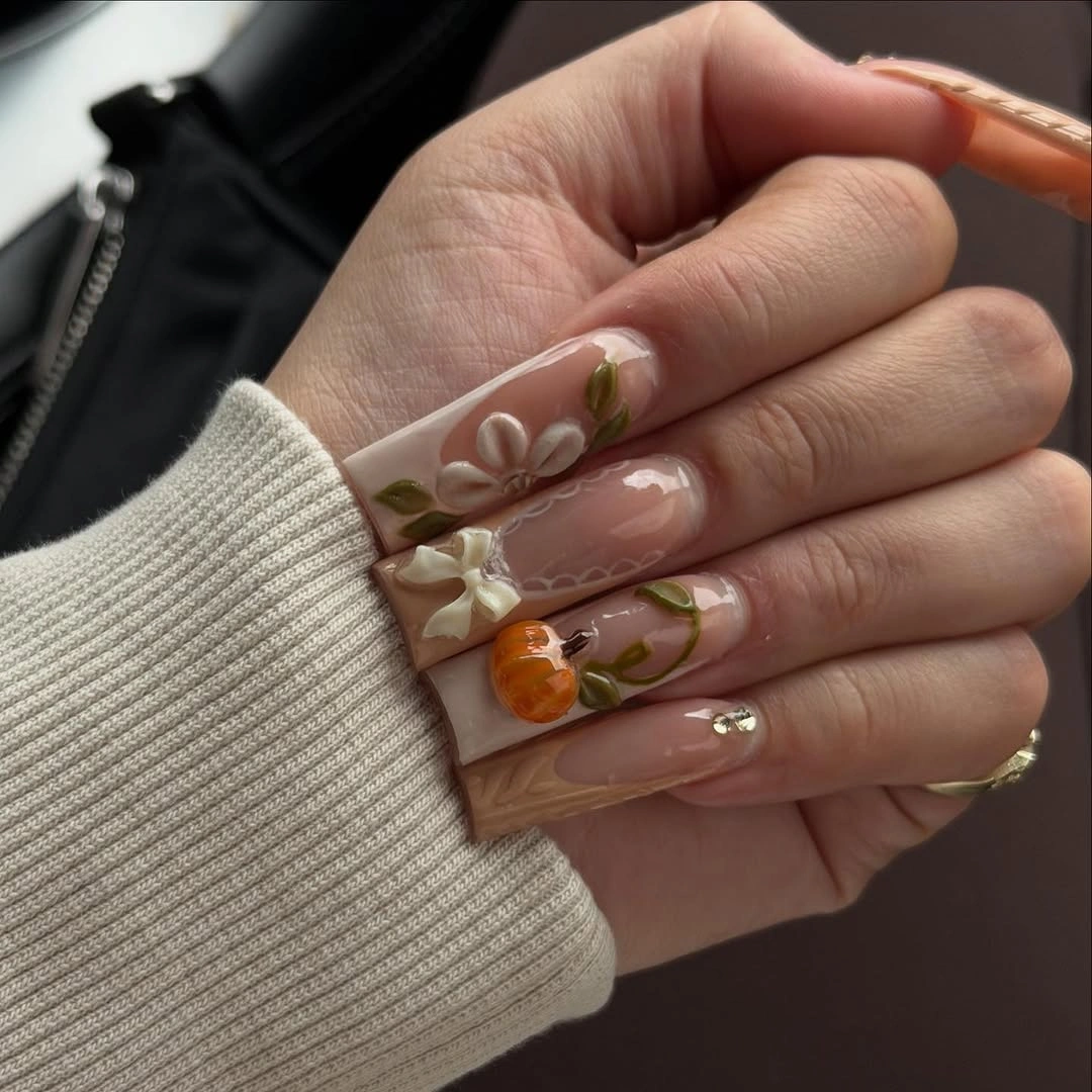 Nude square nails with pumpkin vines and raised flowers