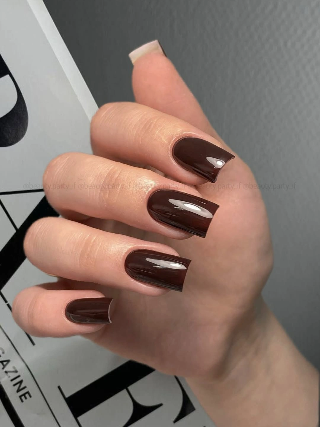 Medium square nails in a smooth glossy chocolate brown shade