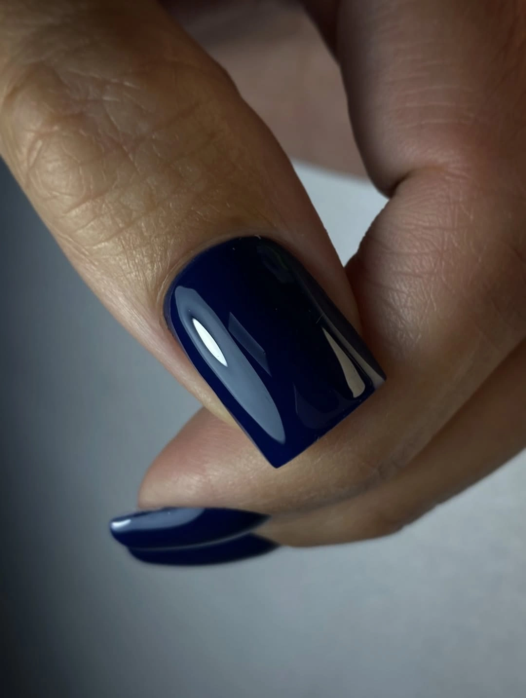 Medium square nails in saturated glossy violet purple