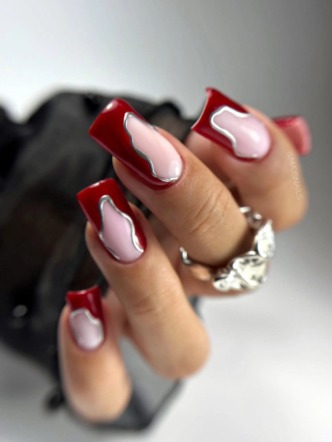 Clear gray coffin nails with silver sparkle and open negative space