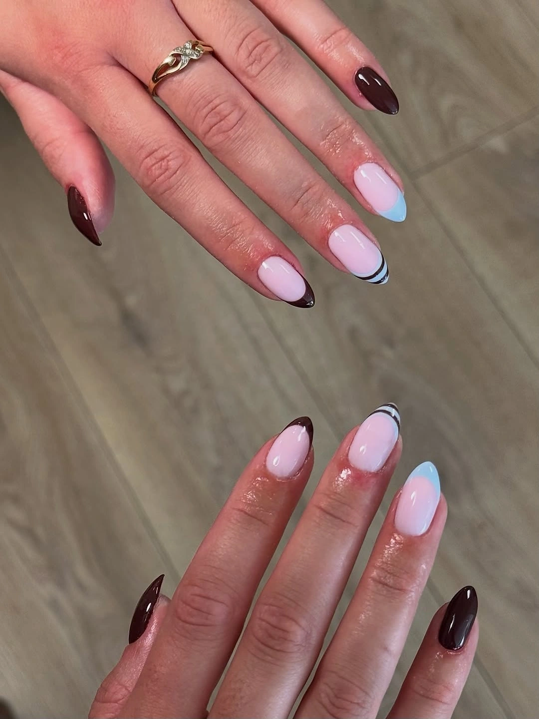 Long almond nails in pink blue and burgundy contrasting tips