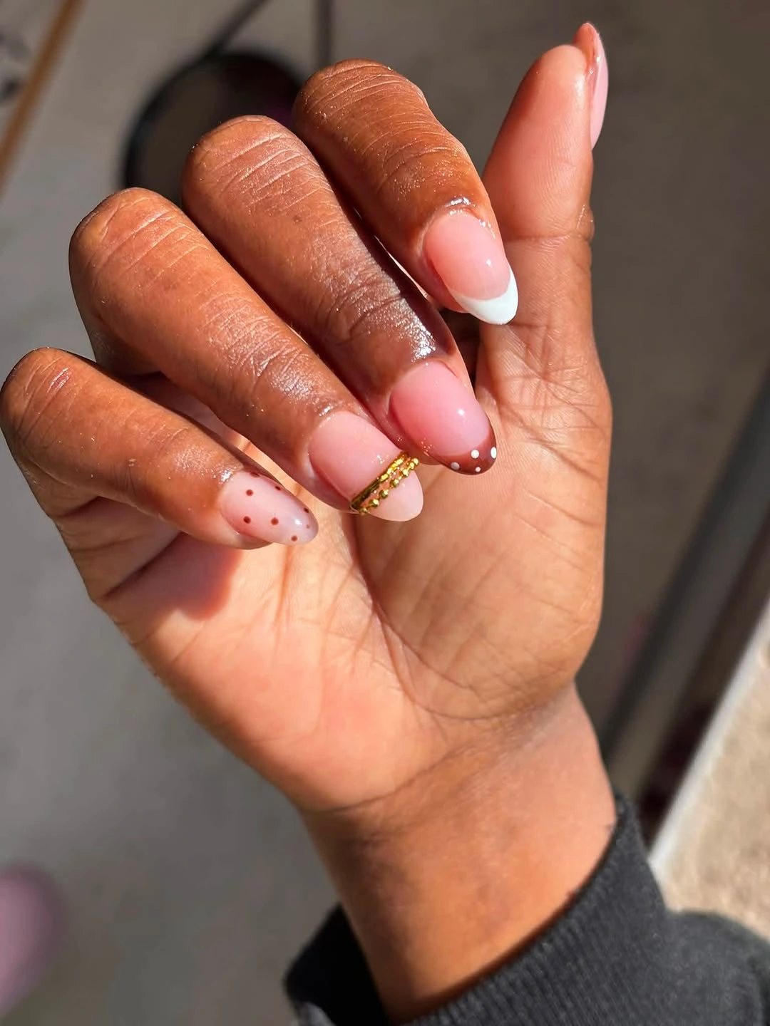 Long almond coral French tip fall nails on dark skin