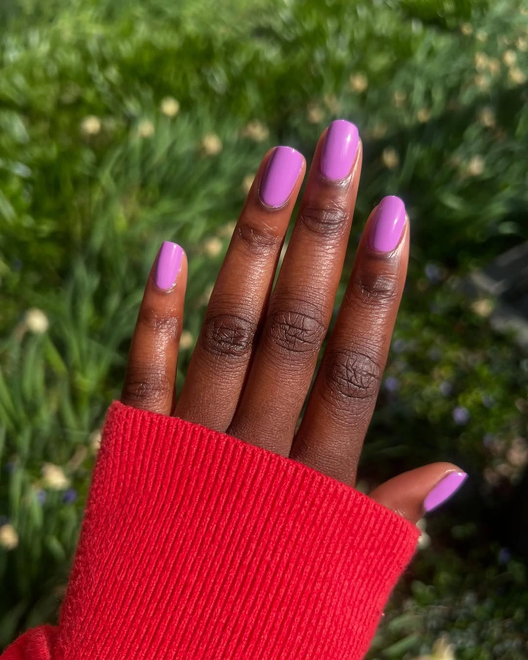 Medium almond vivid violet fall nails on dark skin