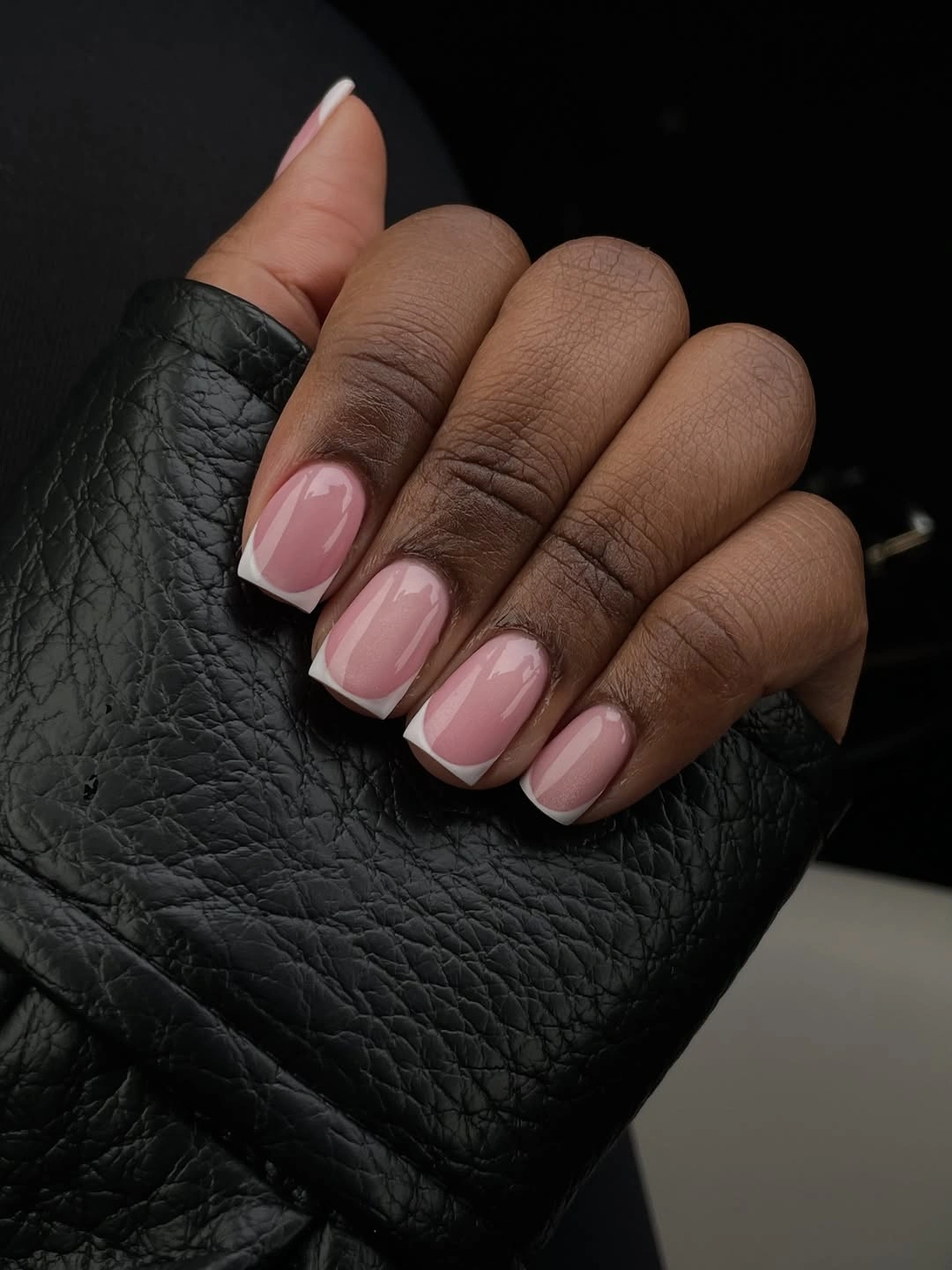 Soft glossy pink short square nails for an understated fall look