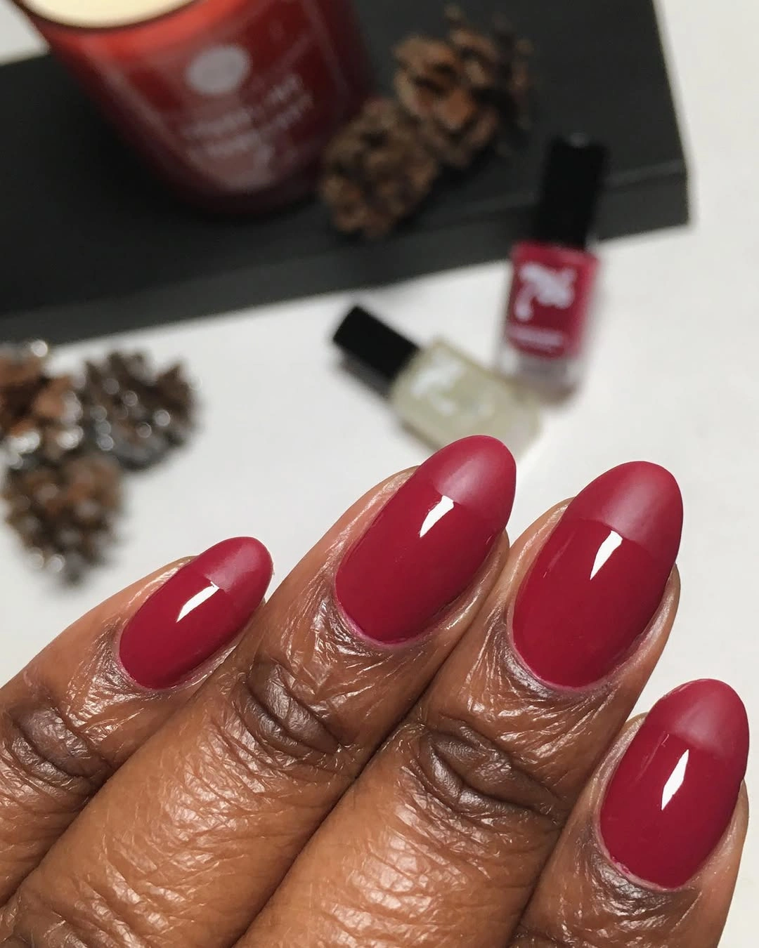 Glossy cherry red rounded square nails for a rich fall manicure