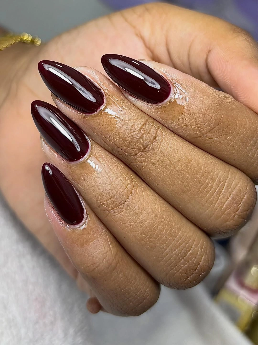 Deep wine glossy almond nails for a rich autumn manicure