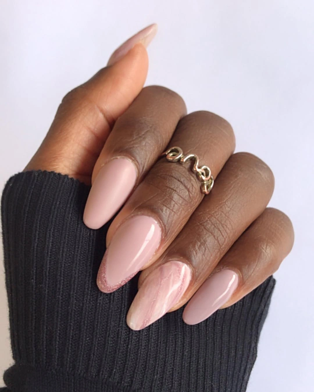 Soft peach glossy almond nails with a simple fall finish