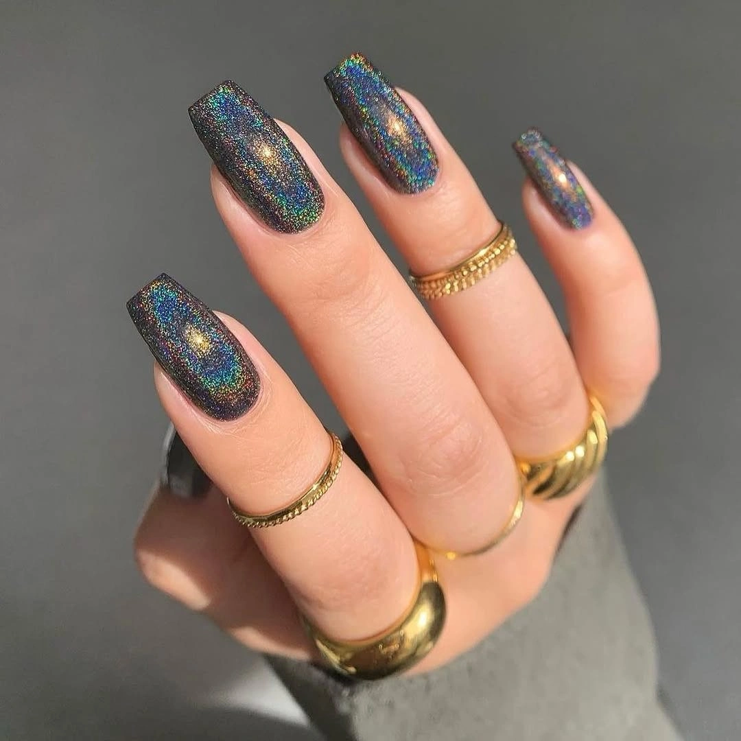 Medium coffin nails with blue green reflective galaxy shimmer