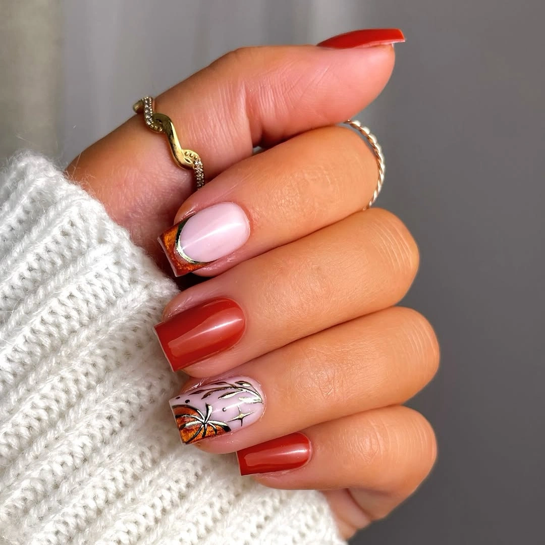 Medium square red blush nails with fine black accent art