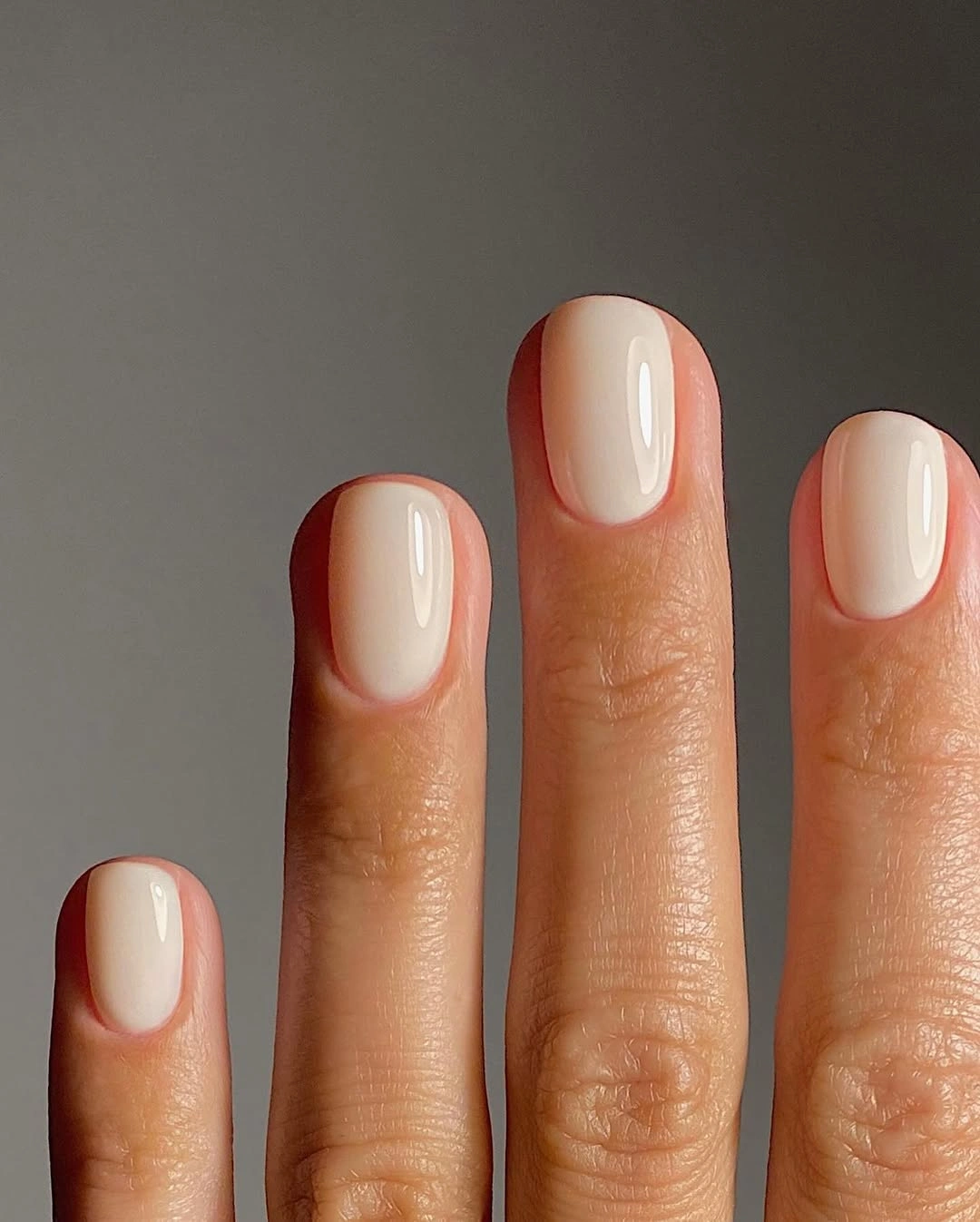 Short square milky ivory nails with a glossy finish
