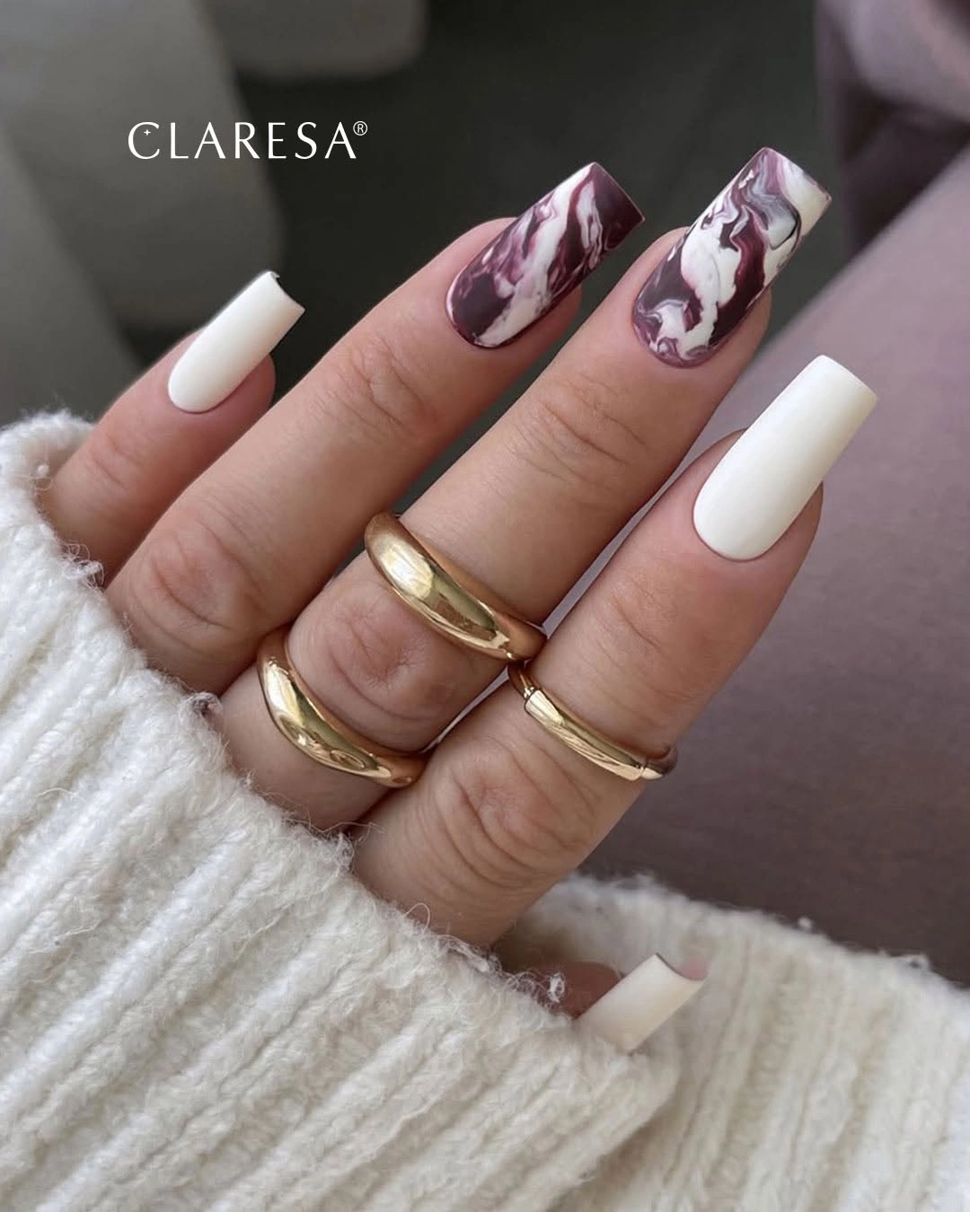 Long square white brown nails with marbled accent