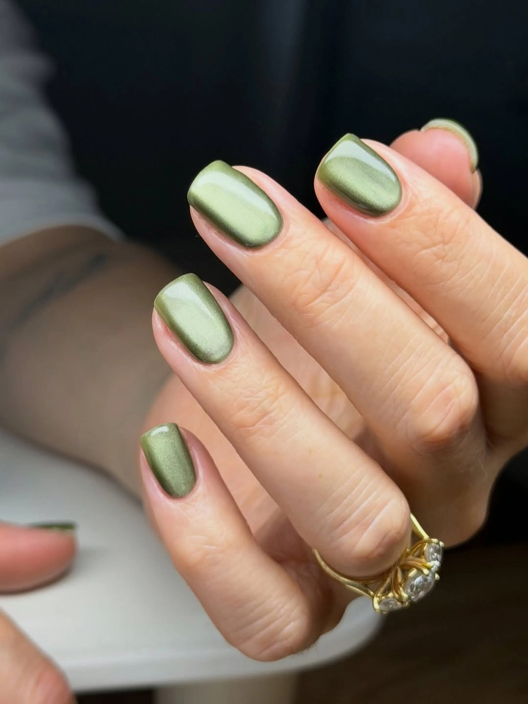 Short olive and pale green diagonal fall nail design