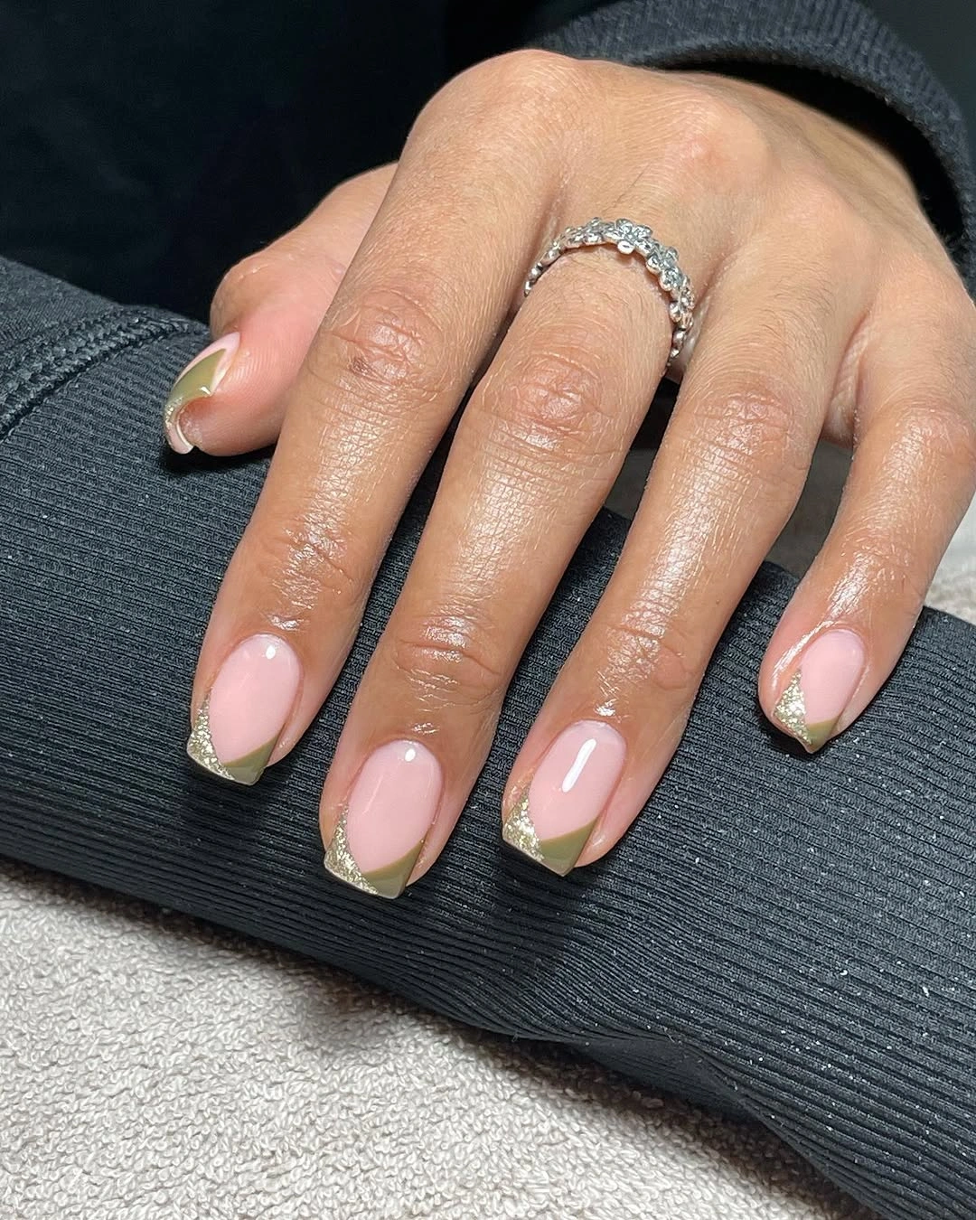 Short rounded champagne gold nails with gentle sheen