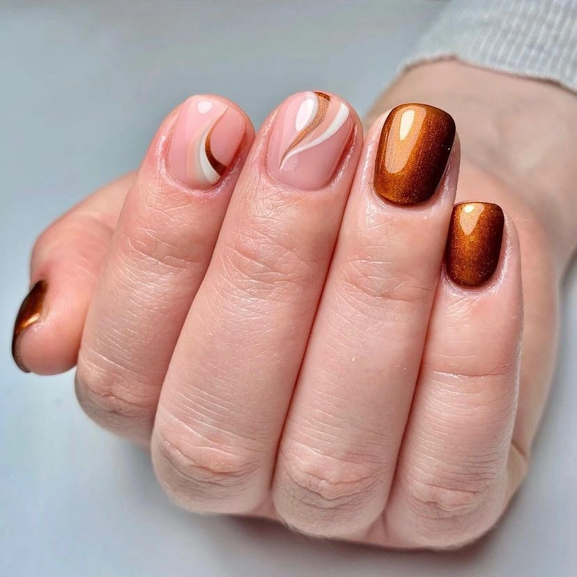 Blush nude nails with copper brown reflective accents