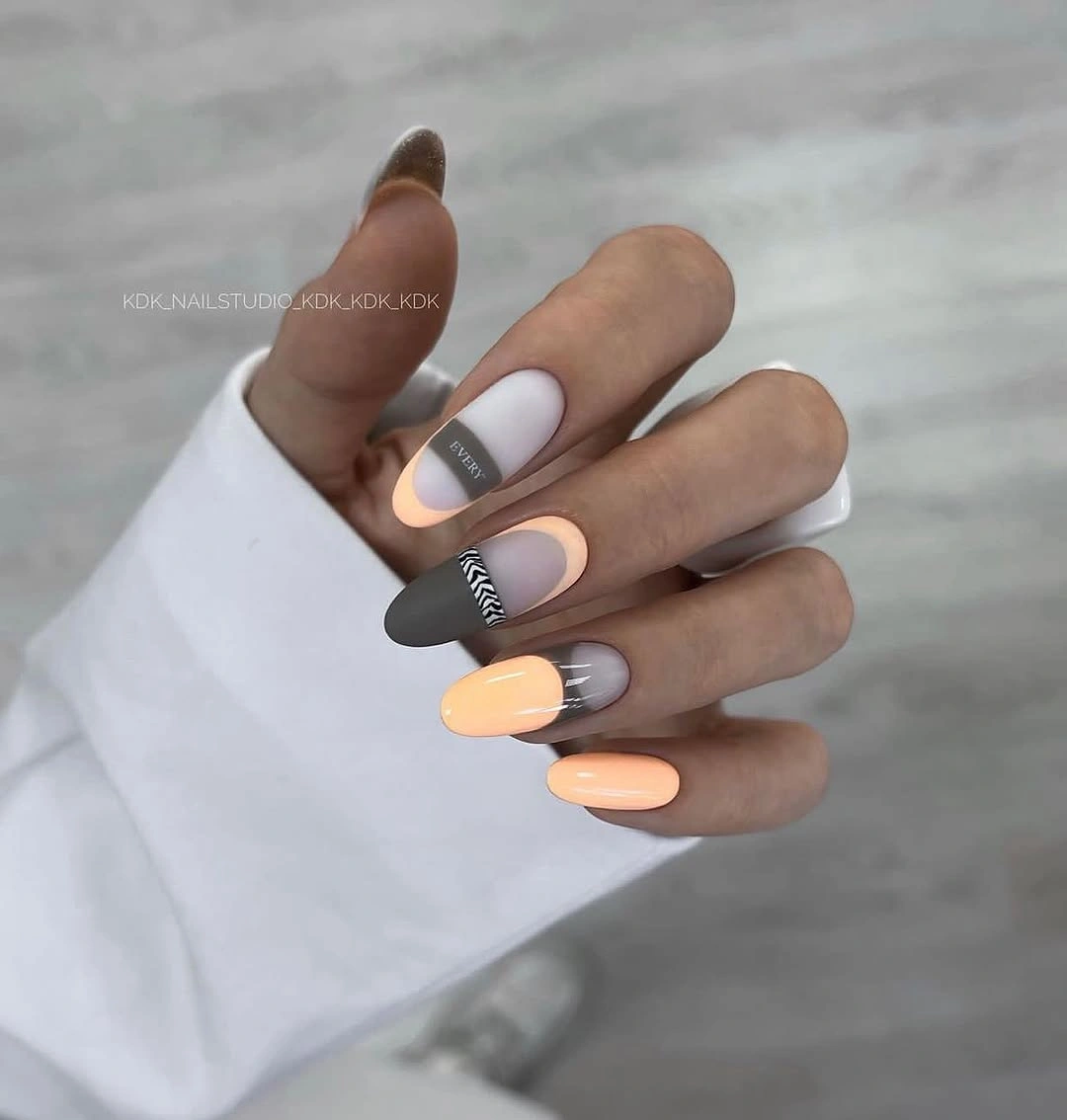 Medium almond nails with camel charcoal and muted peach blocks