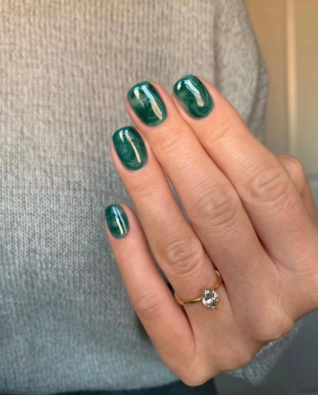Short glossy forest green oval nails for fall
