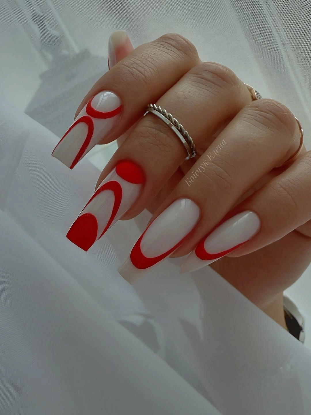 Nude white red square nails with negative space curves