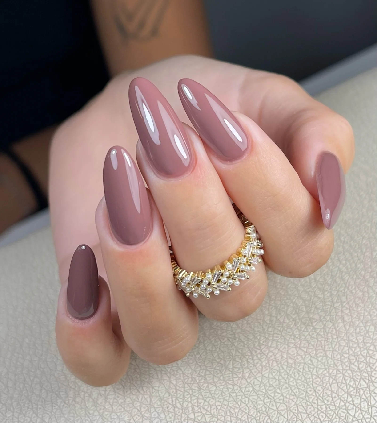 Long glossy muted mauve taupe almond nails