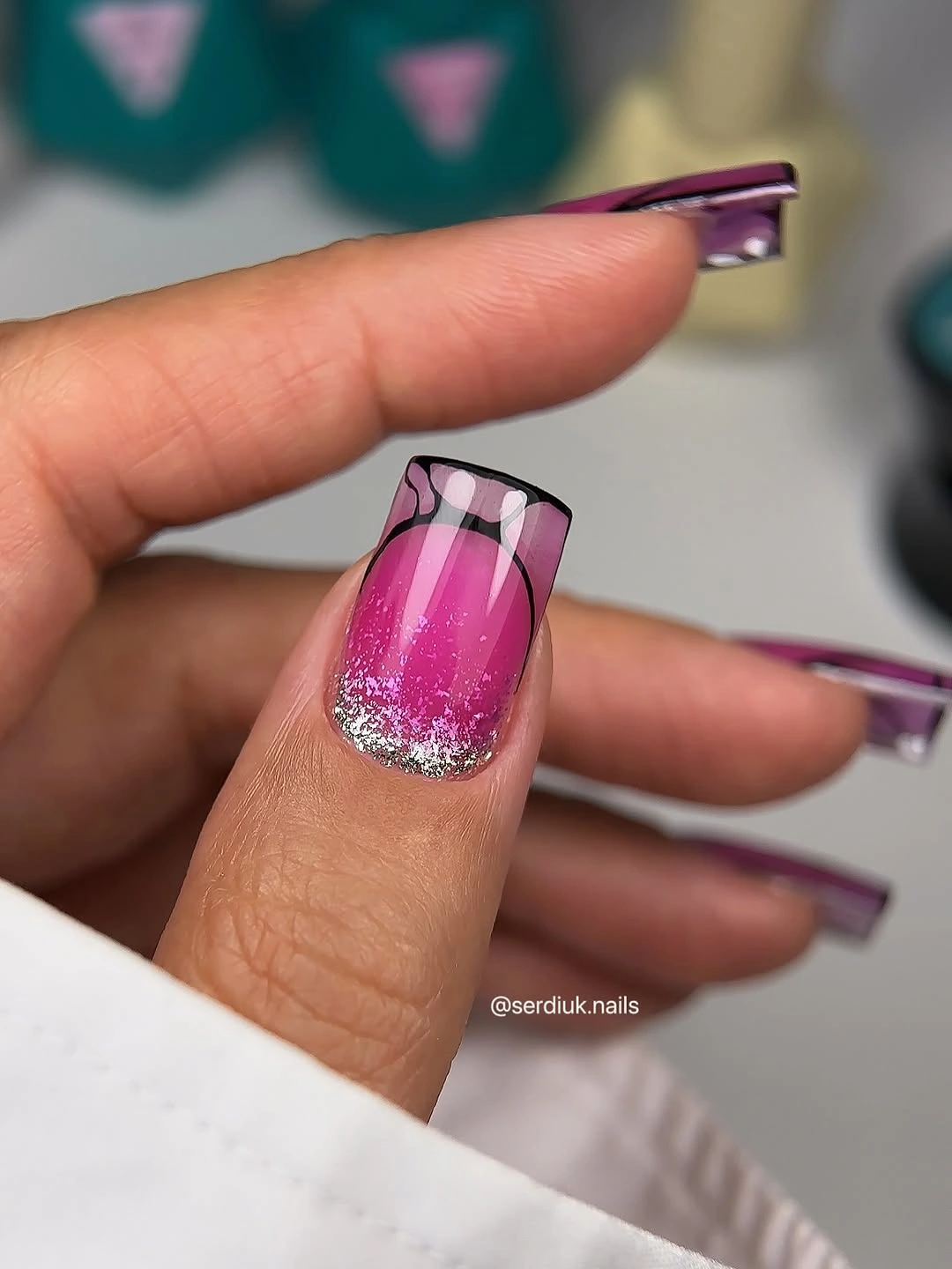 Short square hot pink ombre nail with silver glitter