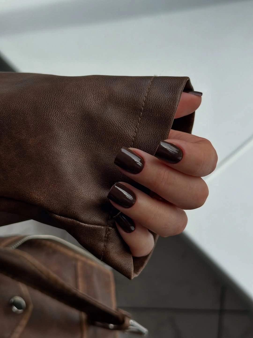 Short square espresso black nails with glossy reflection