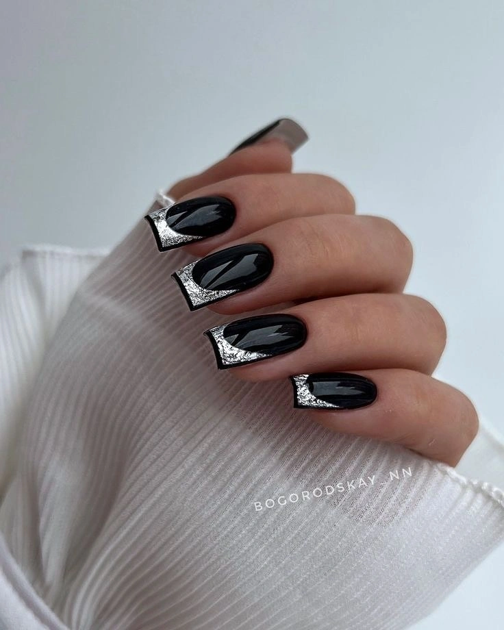 Long glossy black square nails with silver metallic tips