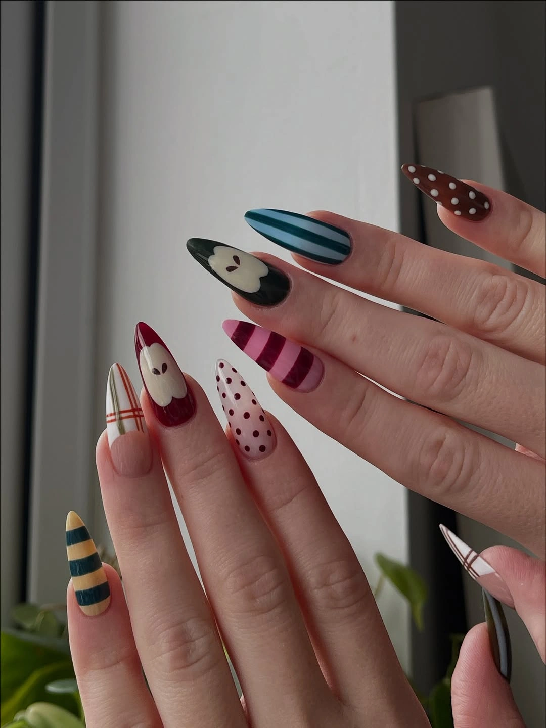 Very long mixed fall nails with stripes dots and graphic accents