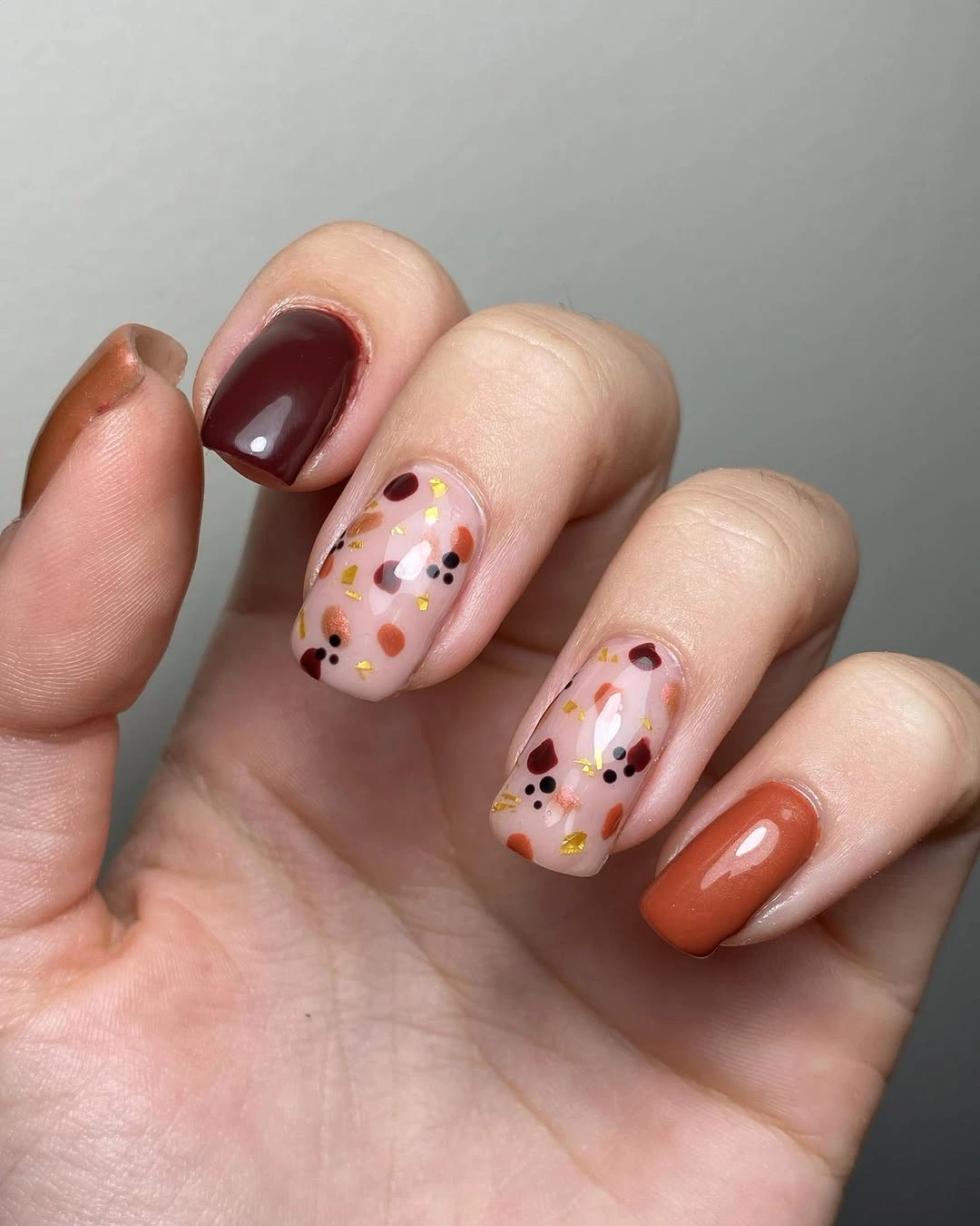 Medium square pink nails with cloudy blue panels and silver arcs