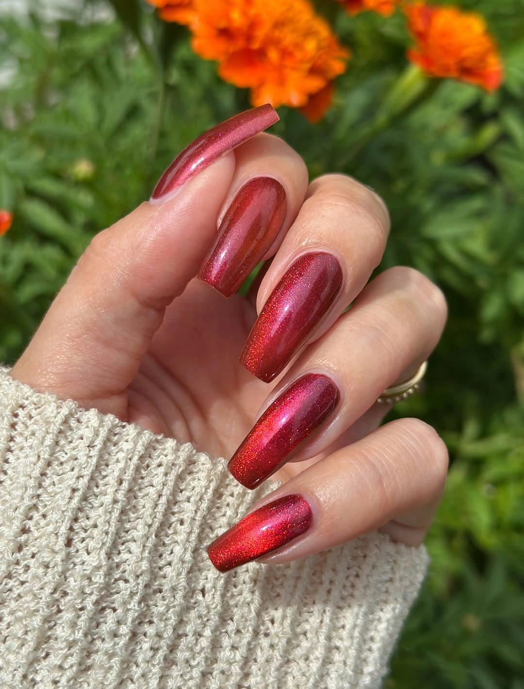 Long square red nails with reflective shimmer