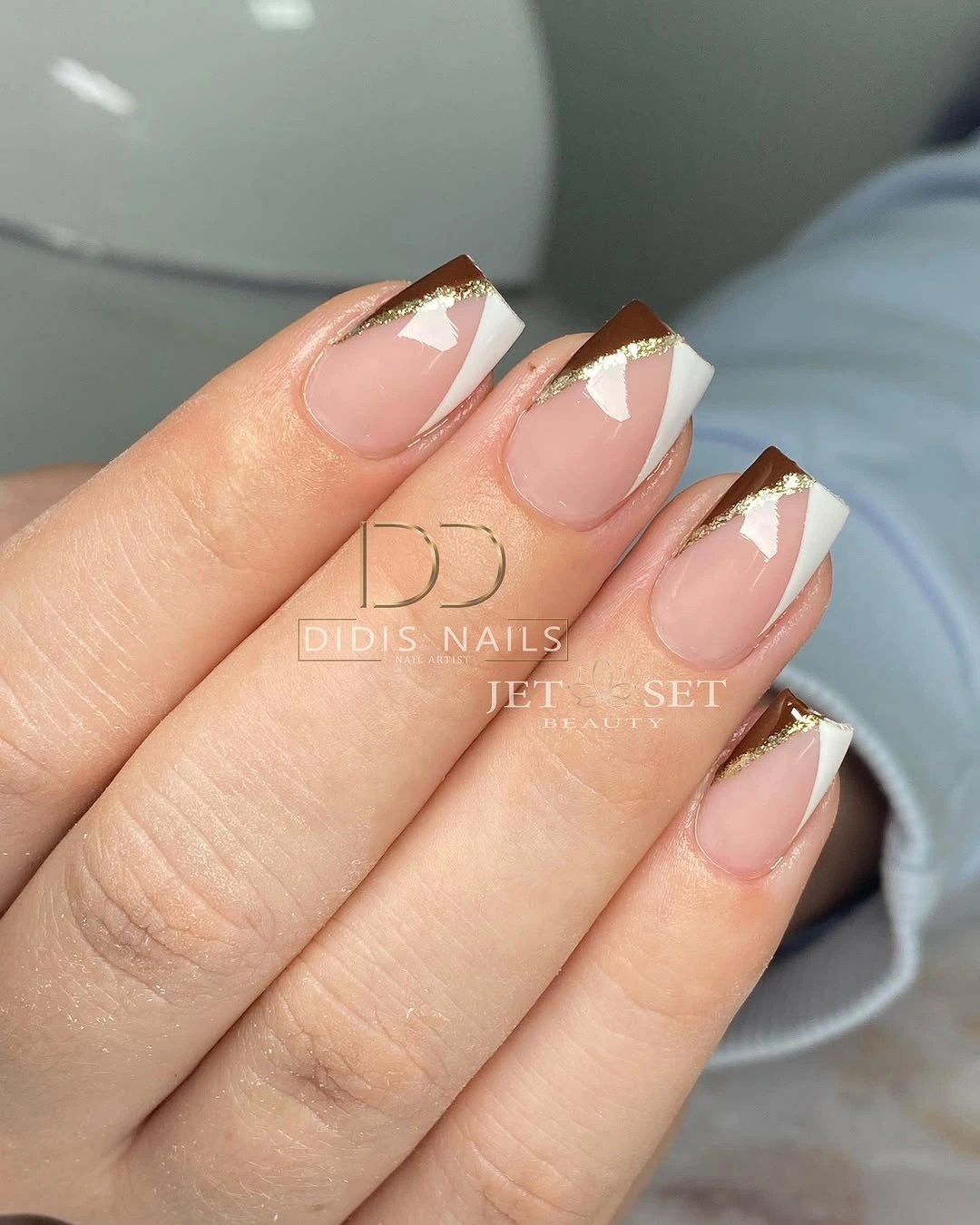 Medium tapered French nails with warm tiny accents