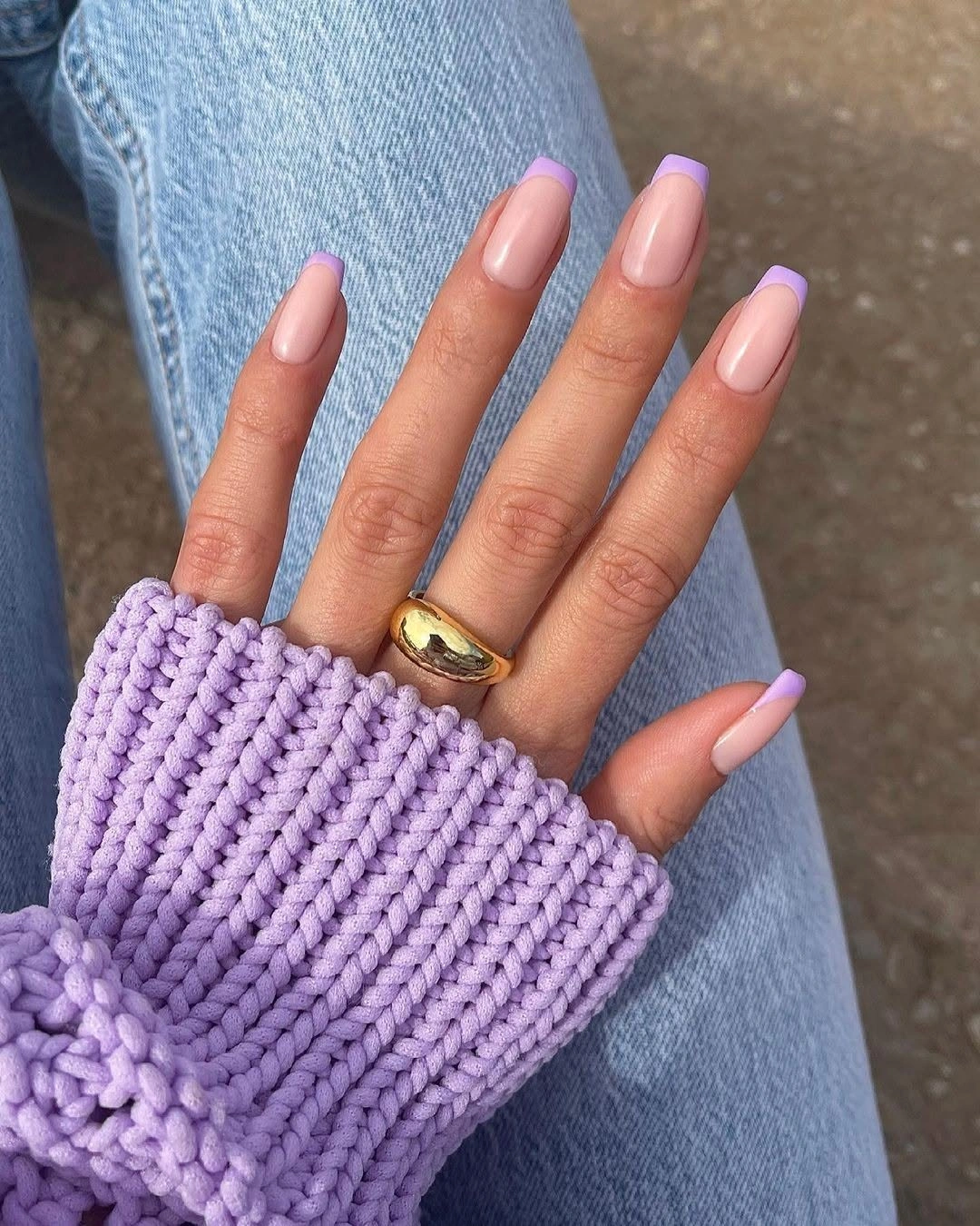 Long glossy lilac nails in a tapered silhouette